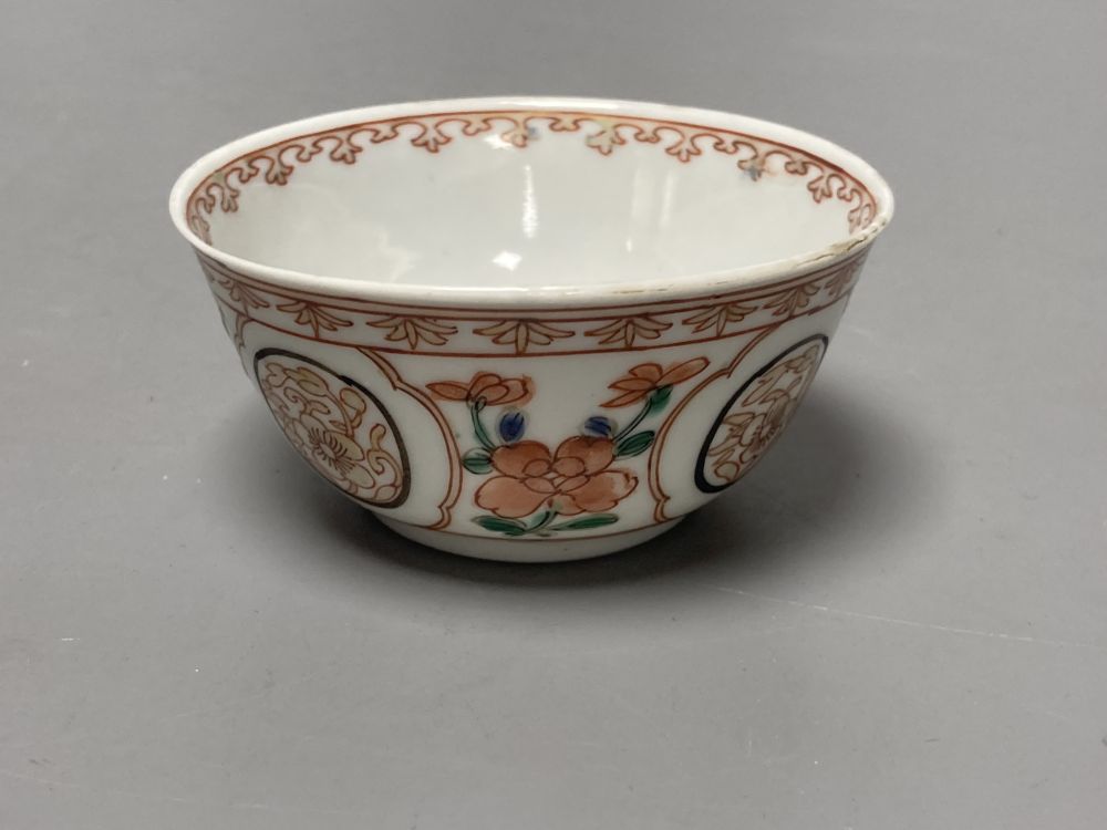 An 18th century Chinese famille rose bowl, 11.5cm diameter, and three smaller Chinese porcelain bowls